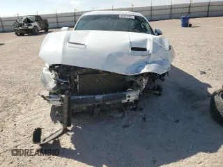 2021 Ford Mustang GT z VIN 1FA6P8CF2M5117291, wystawiony jako Copart lot #46327595 z przebiegiem Nie podano mil oraz Szkody całkowita. Historia ofert i sprzedaży dostępna na DreamBid. Obrazek 5.