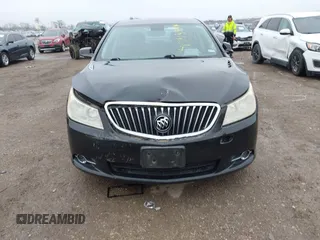 2013 Buick LaCrosse Premium 1 z VIN 1G4GF5E37DF174904, wystawiony jako IAAI lot #41544879 z przebiegiem 157 979 mil mil oraz . Historia ofert i sprzedaży dostępna na DreamBid. Obrazek 6.