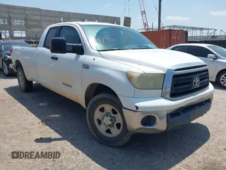 2010 Toyota Tundra SR with VIN 5TFTY5F19AX006696, listed as a IAAI auction lot 42379570 with 332,246 mi miles and . Bid and sale history available at DreamBid. Image 1.