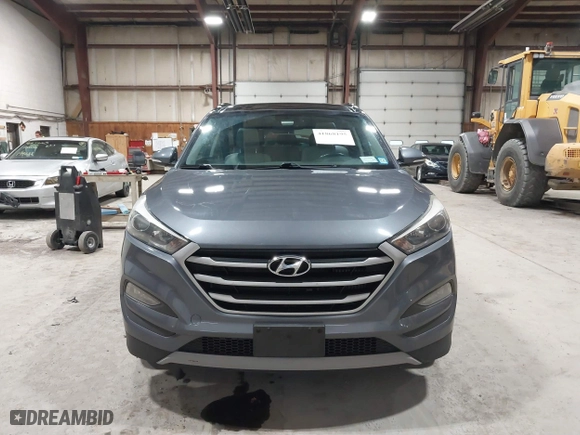 2018 Hyundai Tucson Value with VIN KM8J3CA22JU688957, listed as a IAAI auction lot 41868195 with 117,256 mi miles. Bid and sale history available at carsss.com. Image 12.