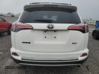 2018 Toyota RAV4 XLE with VIN JTMWFREV3JJ746262, listed as a Copart auction lot 51811035 with 84,319 mi miles and Salvage Title. Bid and sale history available at DreamBid. Image 6.