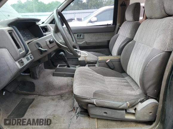 1990 Nissan Hardbody with VIN 1N6HD16SXLC327964, listed as a Copart auction lot 55984175 with 241,289 mi miles and Clean Title. Bid and sale history available at DreamBid. Image 7.