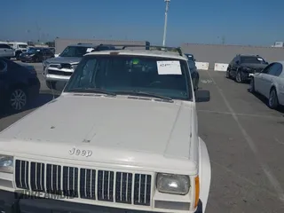 1996 Jeep Cherokee Sport with VIN 1J4FT68S7TL265733, listed as a IAAI auction lot 42499228 with 230,001 mi miles and . Bid and sale history available at DreamBid. Image 6.