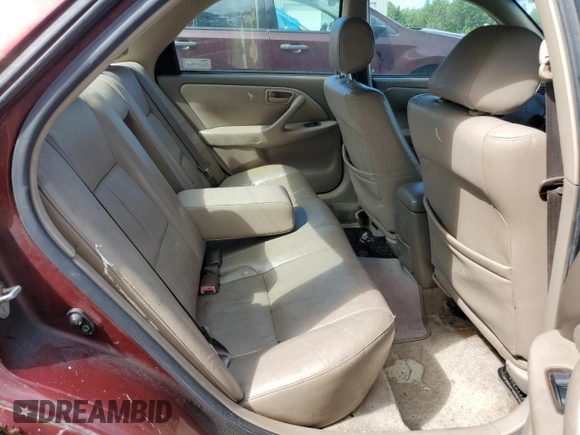 2001 Toyota Camry LE z VIN JT2BF22K610295178, wystawiony jako Copart lot #68538524 z przebiegiem 507 822 mil mil oraz Szkoda całkowita • Salvage title. Historia ofert i sprzedaży dostępna na DreamBid. Obrazek 10.