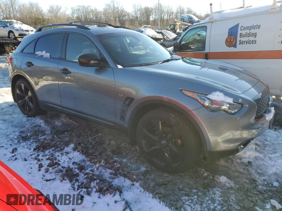 2015 Infiniti QX70 z VIN JN8CS1MW2FM481841, wystawiony jako Copart lot #41459505 z przebiegiem Nie podano mil oraz Szkoda całkowita • Salvage title. Historia ofert i sprzedaży dostępna na DreamBid. Obrazek 4.