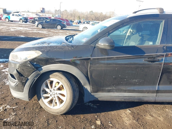 2016 Hyundai Tucson SE with VIN KM8J3CA42GU076476, listed as a IAAI auction lot 41272580 with 112,010 mi miles. Bid and sale history available at carsss.com. Image 17.