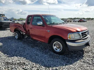 2000 Ford F-150 XL with VIN 1FTRX17W3YNB80866, listed as a Copart auction lot 61151005 with Not provided miles and Salvage title. Bid and sale history available at DreamBid. Image 4.