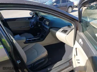 2017 Hyundai Sonata SE with VIN 5NPE24AF9HH595892, listed as a IAAI auction lot 40324082 with 144,233 mi miles. Bid and sale history available at carsss.com. Image 5.