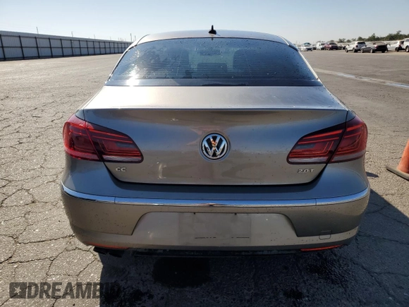 2013 Volkswagen CC R-Line with VIN WVWBP7AN2DE556410, listed as a Copart auction lot 77360244 with 114,891 mi miles and Salvage Title. Bid and sale history available at DreamBid. Image 6.
