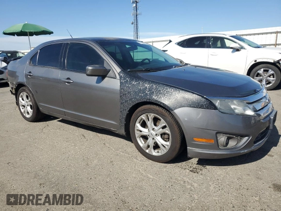 2012 Ford Fusion SE with VIN 3FAHP0HA1CR401191, listed as a Copart auction lot 61968675 with 177,018 mi miles and Salvage title. Bid and sale history available at DreamBid. Image 4.