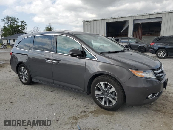 2016 Honda Odyssey Touring Elite с VIN 5FNRL5H99GB090100, выставлен на аукционе Copart как лот 52367795 с пробегом 60 615 миль миль и Списание • Salvage title. История ставок и продаж доступна на DreamBid. Изображение 4.