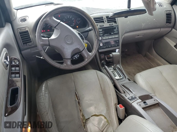 2000 Nissan Maxima GXE with VIN JN1CA31A1YT223132, listed as a Copart auction lot 60148655 with 269,258 mi miles and Salvage title. Bid and sale history available at DreamBid. Image 8.