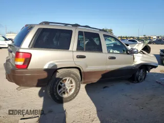 2003 Jeep Grand Cherokee Laredo z VIN 1J4GX48N63C509220, wystawiony jako Copart lot #72730964 z przebiegiem 95 216 mil mil oraz Szkoda całkowita • Salvage title. Historia ofert i sprzedaży dostępna na DreamBid. Obrazek 3.