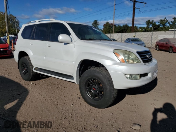 2004 Lexus GX 470 with VIN JTJBT20X440055224, listed as a Copart auction lot 75511534 with 87,324 mi miles and Salvage Title. Bid and sale history available at carsss.com. Image 4.