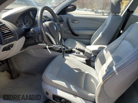 2009 BMW 1 Series 128i with VIN WBAUP93519VF48985, listed as a Copart auction lot 50715925 with 105,590 mi miles and Salvage title. Bid and sale history available at DreamBid. Image 7.