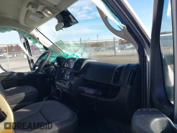 2023 Ram ProMaster Cargo with VIN 3C6MRVJG5PE501250, listed as a IAAI auction lot 40670587 with 97,369 mi miles and . Bid and sale history available at DreamBid. Image 5.