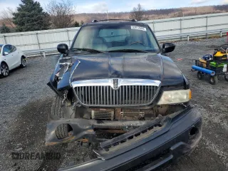 2001 Lincoln Navigator z VIN 5LMFU28R01LJ32925, wystawiony jako Copart lot #83013504 z przebiegiem 132 750 mil mil oraz Szkody całkowita. Historia ofert i sprzedaży dostępna na DreamBid. Obrazek 5.