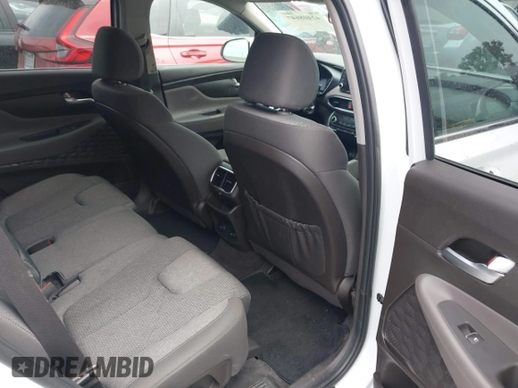 2020 Hyundai Santa Fe SE with VIN 5NMS23AD8LH285363, listed as a IAAI auction lot 42408647 with 60,058 mi miles and . Bid and sale history available at DreamBid. Image 8.