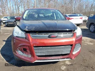 2015 Ford Escape SE with VIN 1FMCU9GX7FUC33881, listed as a IAAI auction lot 41397702 with 157,914 mi miles. Bid and sale history available at carsss.com. Image 6.