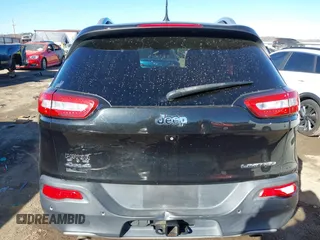 2014 Jeep Cherokee Limited with VIN 1C4PJMDS6EW190972, listed as a IAAI auction lot 41672533 with 213,228 mi miles and . Bid and sale history available at DreamBid. Image 17.