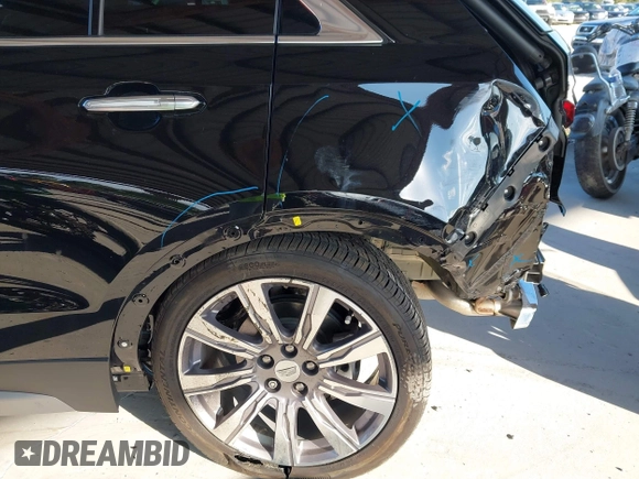 2020 Cadillac XT4 FWD Premium Luxury with VIN 1GYFZCR42LF144359, listed as a IAAI auction lot 42012677 with 34,490 mi miles and . Bid and sale history available at carsss.com. Image 18.
