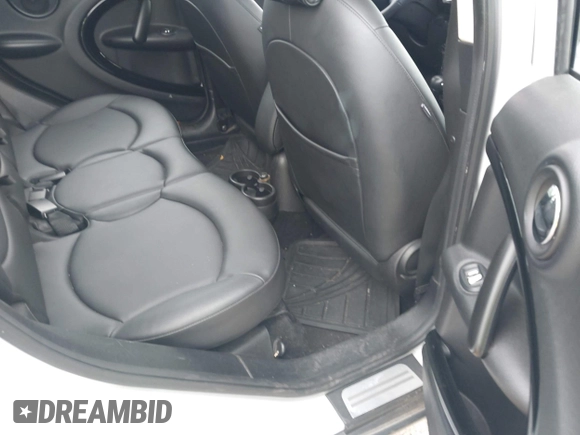 2014 MINI Countryman with VIN WMWZB3C5XEWR37594, listed as a IAAI auction lot 42500466 with 67,589 mi miles and . Bid and sale history available at DreamBid. Image 8.