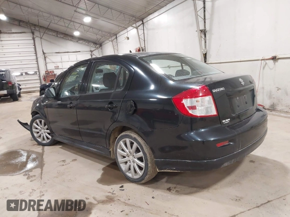 2010 Suzuki SX4 with VIN JS2YC5A40A6300005, listed as a IAAI auction lot 41810017 with 101,896 mi miles and . Bid and sale history available at DreamBid. Image 3.