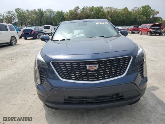 2022 Cadillac XT4 FWD Luxury with VIN 1GYAZAR47NF120348, listed as a Copart auction lot 50187025 with 76,886 mi miles and Non Repairable. Bid and sale history available at carsss.com. Image 5.