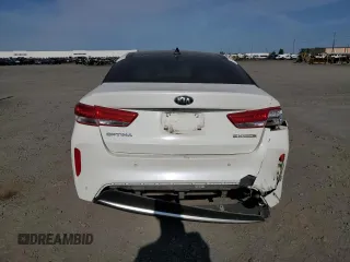 2017 Kia Optima EX z VIN KNAGU4LE9H5013620, wystawiony jako Copart lot #60928515 z przebiegiem 158 263 mil mil oraz Szkoda całkowita • Salvage title. Historia ofert i sprzedaży dostępna na DreamBid. Obrazek 6.