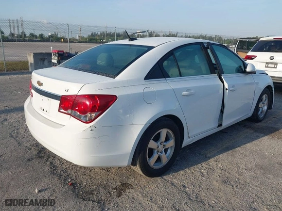 2014 Chevrolet Cruze 1LT with VIN 1G1PC5SBXE7251617, listed as a IAAI auction lot 41854990 with 128,691 mi miles. Bid and sale history available at carsss.com. Image 4.