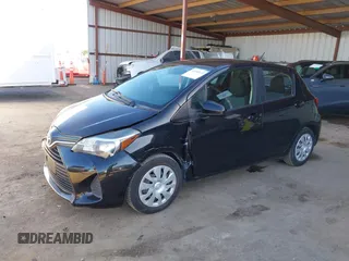 2015 Toyota Yaris L with VIN VNKKTUD32FA030980, listed as a IAAI auction lot 41655132 with 106,826 mi miles and . Bid and sale history available at carsss.com. Image 6.
