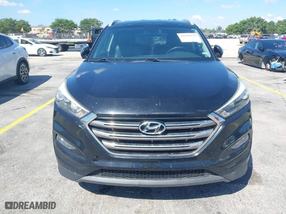 2016 Hyundai Tucson Eco with VIN KM8J3CA21GU175904, listed as a IAAI auction lot 41898678 with 117,985 mi miles. Bid and sale history available at carsss.com. Image 6.