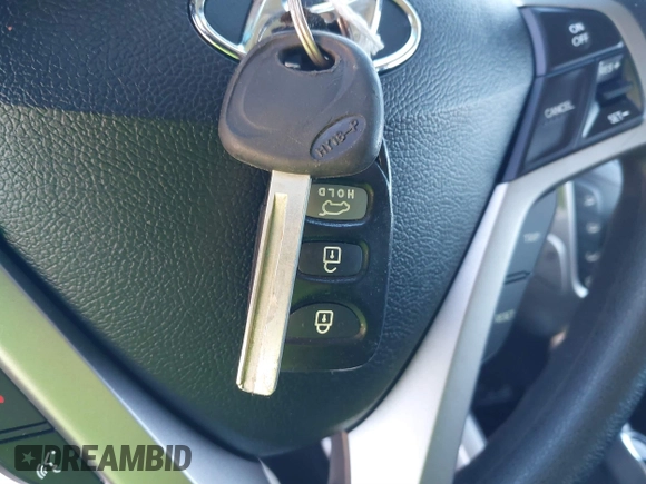2012 Hyundai Veloster w/Black Int с VIN KMHTC6AD8CU046029, выставлен на аукционе IAAI как лот 41664151 с пробегом 163 523 миль миль и . История ставок и продаж доступна на DreamBid. Изображение 11.