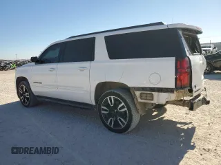 2019 Chevrolet Suburban Premier with VIN 1GNSKJKJ1KR166497, listed as a Copart auction lot 87331014 with 162,269 mi miles and Salvage Title. Bid and sale history available at DreamBid. Image 2.