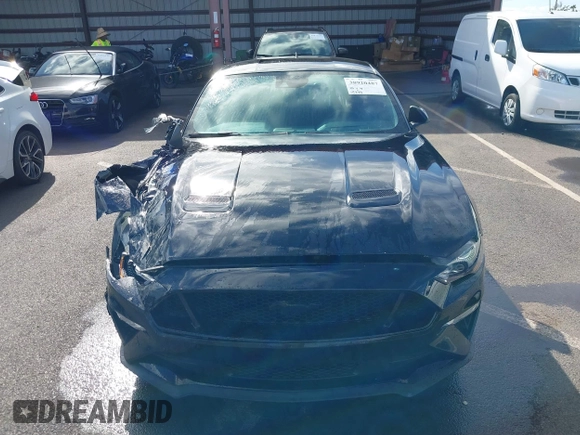 2021 Ford Mustang GT z VIN 1FA6P8CF1M5147740, wystawiony jako IAAI lot #38920487 z przebiegiem 15 299 mil mil oraz . Historia ofert i sprzedaży dostępna na DreamBid. Obrazek 12.