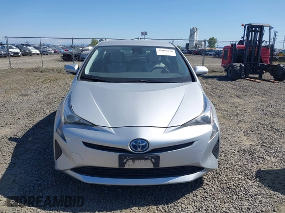 2017 Toyota Prius Two with VIN JTDKBRFU7H3032469, listed as a IAAI auction lot 42097816 with 65,853 mi miles and . Bid and sale history available at DreamBid. Image 12.