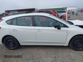 2018 Subaru Impreza with VIN 4S3GTAA69J1712050, listed as a IAAI auction lot 41236817 with 89,171 mi miles. Bid and sale history available at carsss.com. Image 13.