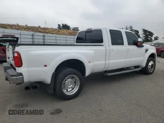 2010 Ford F-450 with VIN 1FTXW4CR9AEA96908, listed as a Copart auction lot 60075265 with 124,396 mi miles and Clean title. Bid and sale history available at DreamBid. Image 3.