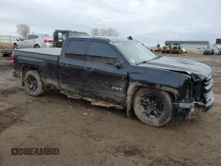 2017 Chevrolet Silverado 1500 LT with VIN 1GCVKREC0HZ402180, listed as a Copart auction lot 47823975 with 155,733 mi miles and Salvage Title. Bid and sale history available at DreamBid. Image 4.