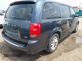 2013 Dodge Grand Caravan SXT with VIN 2C4RDGCGXDR749803, listed as a IAAI auction lot 42118722 with 264,454 mi miles and . Bid and sale history available at DreamBid. Image 4.