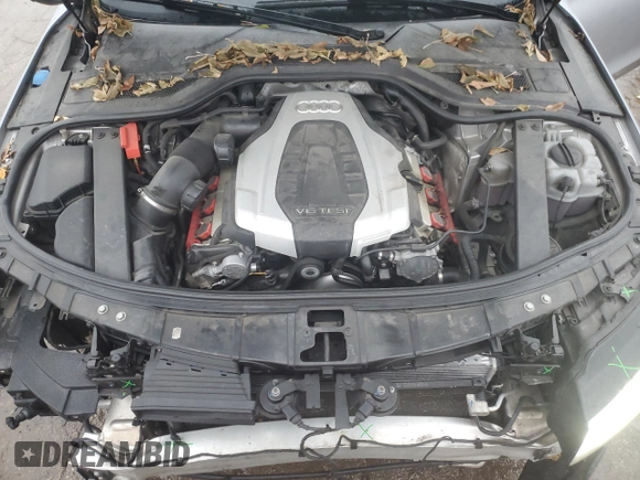 2015 Audi A8 z VIN WAUJGAFD0FN010021, wystawiony jako Copart lot #86861684 z przebiegiem 112 697 mil mil oraz Szkoda całkowita • Salvage title. Historia ofert i sprzedaży dostępna na DreamBid. Obrazek 11.