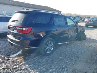 2014 Dodge Durango Limited with VIN 1C4RDJDG0EC428357, listed as a IAAI auction lot 41982340 with 62,910 mi miles. Bid and sale history available at carsss.com. Image 4.