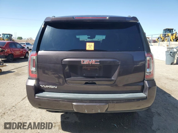 2015 GMC Yukon SLT z VIN 1GKS1BKC5FR689549, wystawiony jako Copart lot #56747385 z przebiegiem 102 856 mil mil oraz Szkoda całkowita • Salvage title. Historia ofert i sprzedaży dostępna na DreamBid. Obrazek 6.