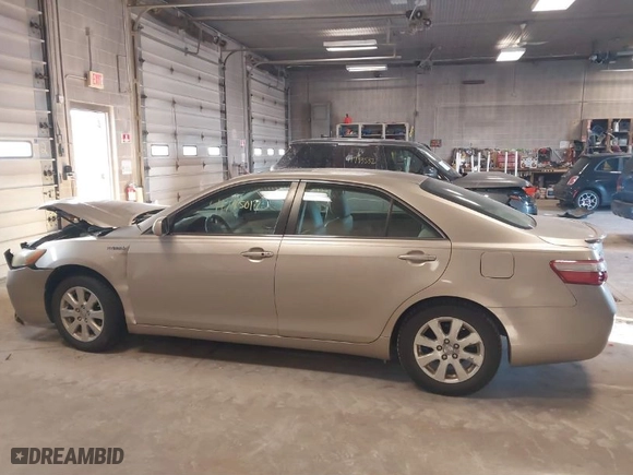 2009 Toyota Camry Hybrid with VIN JTNBB46K793052834, listed as a IAAI auction lot 41795017 with 243,223 mi miles. Bid and sale history available at carsss.com. Image 14.