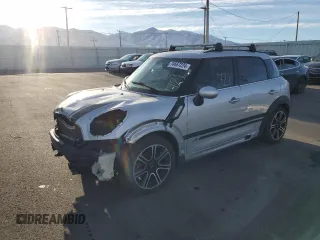 2015 MINI Countryman John Cooper Works with VIN WMWXD1C53FWS34815, listed as a Copart auction lot 74667224 with 94,971 mi miles and Salvage Title. Bid and sale history available at DreamBid. Image 1.