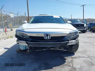 2021 Honda Accord Touring with VIN 1HGCV3F95MA000714, listed as a IAAI auction lot 42350127 with 69,731 mi miles and . Bid and sale history available at DreamBid. Image 6.