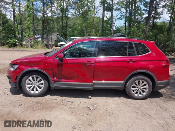 2018 Volkswagen Tiguan SEL with VIN 3VV3B7AX6JM073546, listed as a IAAI auction lot 42439602 with 97,109 mi miles and . Bid and sale history available at DreamBid. Image 14.