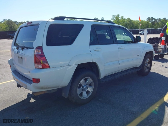 2003 Toyota 4Runner SR5 with VIN JTEZU14R038009325, listed as a IAAI auction lot 42031464 with 282,463 mi miles. Bid and sale history available at carsss.com. Image 4.