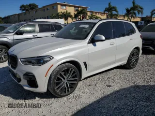 2019 BMW X5 xDrive40i with VIN 5UXCR6C50KLK86199, listed as a Copart auction lot 47523305 with 76,924 mi miles and Salvage Title. Bid and sale history available at DreamBid. Image 1.