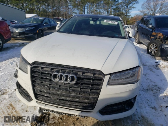 2017 Audi A8 Sport with VIN WAU43AFD1HN010007, listed as a Copart auction lot 86242694 with 68,612 mi miles and Salvage Title. Bid and sale history available at DreamBid. Image 5.